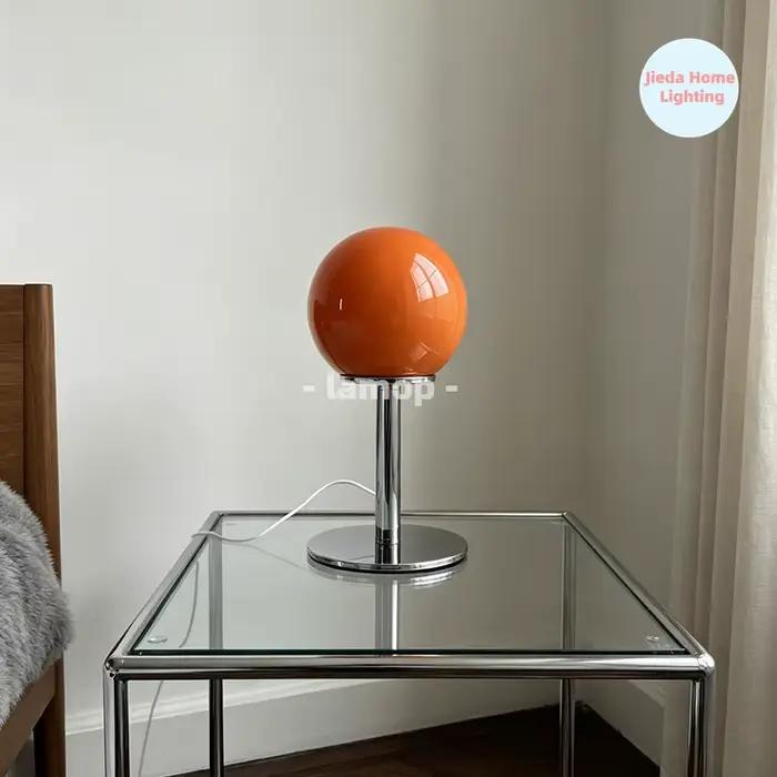 Lampe de table en verre étoile orange brillante