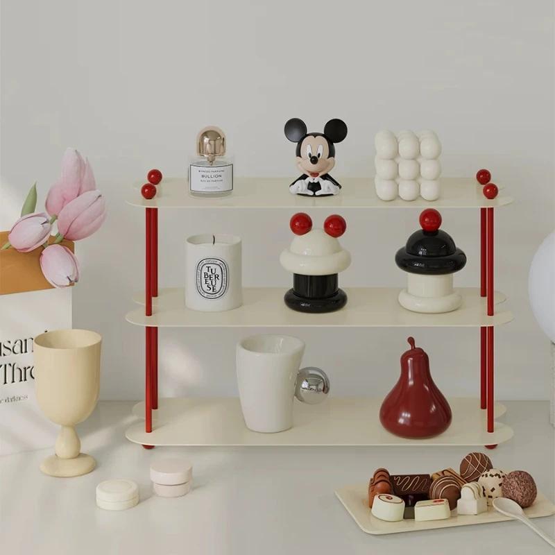 Étagère de bureau rose pour parfums